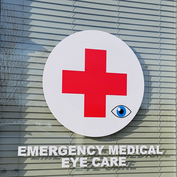 red cross with emergency eye care text
